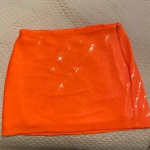 River Island bright orange sequin mini skirt. Never worn. Size 14 UK. 10 US